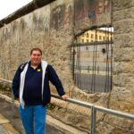 Me in front of the Berlin Wall