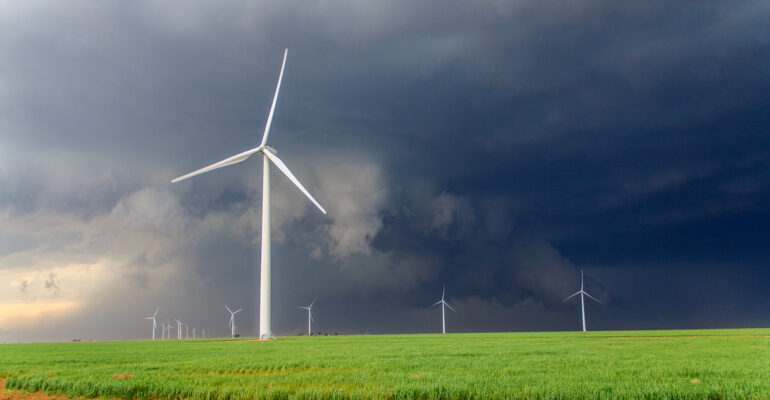 Wall Cloud behind windmills